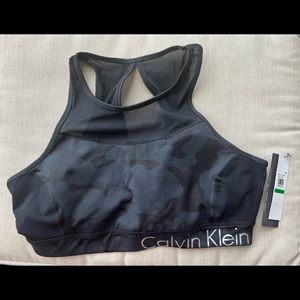 Calvin Klein Performance workout top. Camo print w/mesh accents. New with tags.